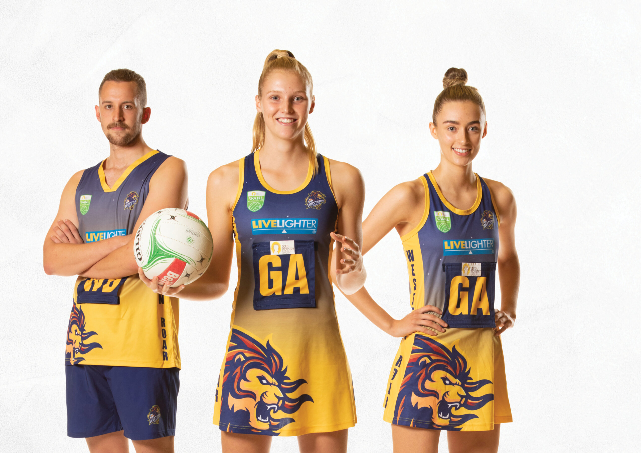 Three Western Roar Netball Players Standing in a line