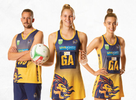 Three Western Roar Netball Players Standing in a line