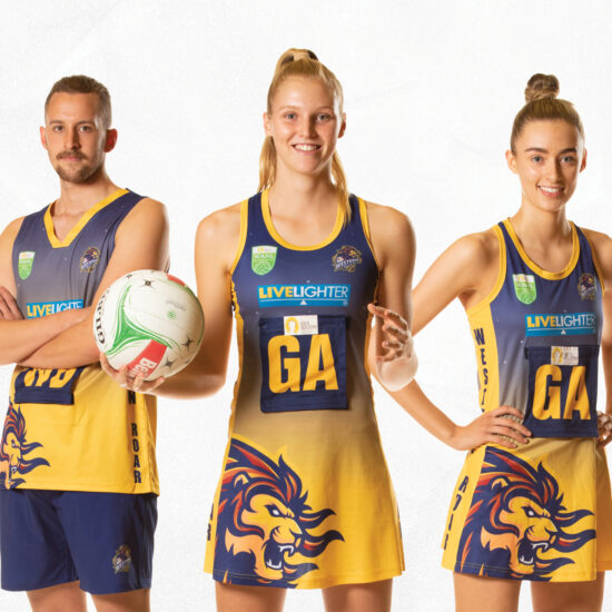 Three Western Roar Netball Players Standing in a line