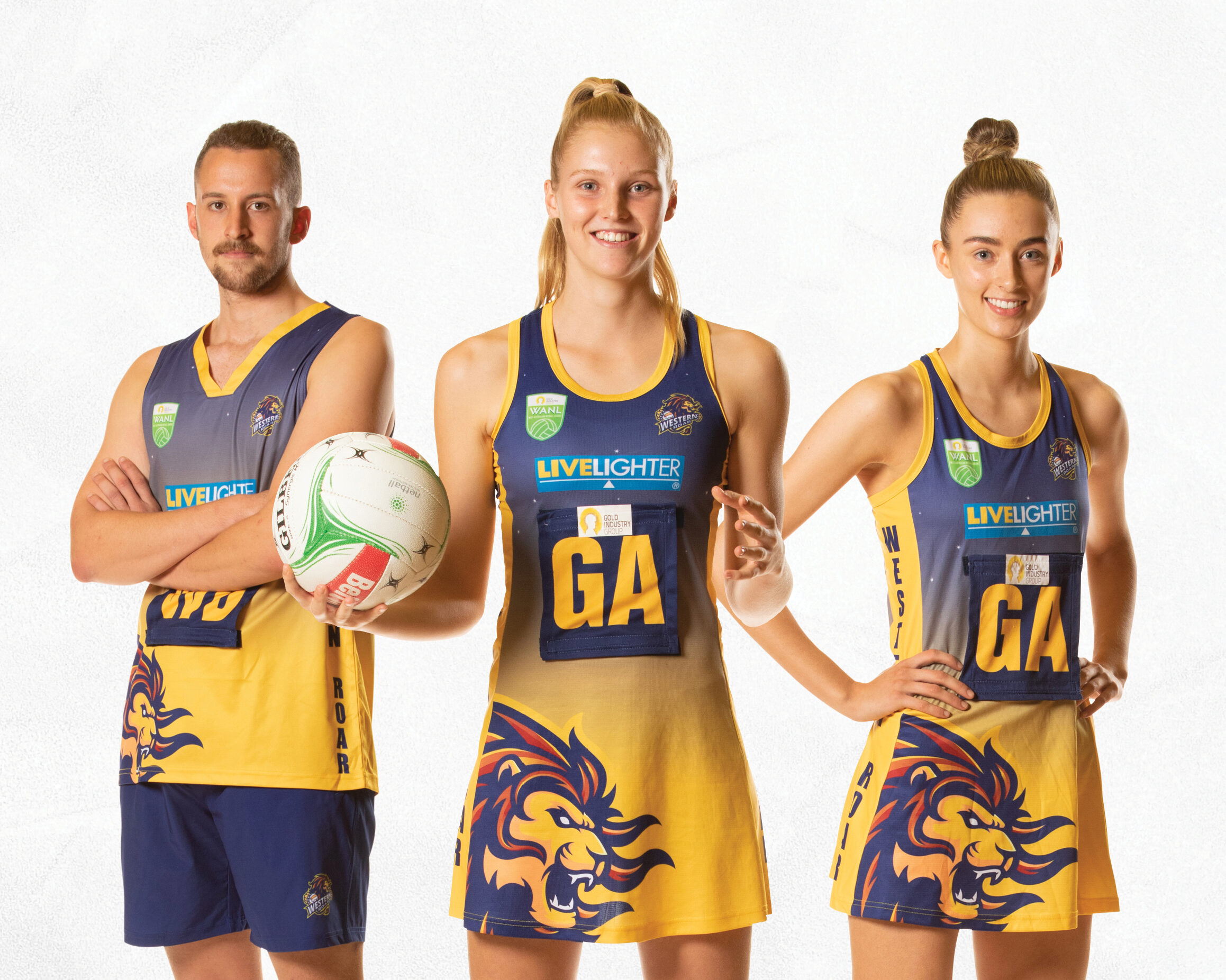 Three Western Roar Netball Players Standing in a line